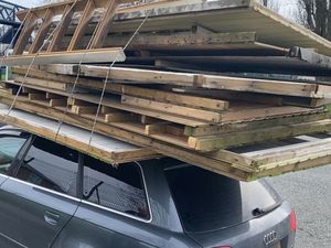 Supporting image for story: 'Miracle' nobody hurt as car stopped on M5 with 11 wooden items piled on top