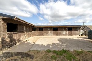 The property features equestrian facilities including stables. Picture: Mark Wiggin Estate Agents/Rightmove