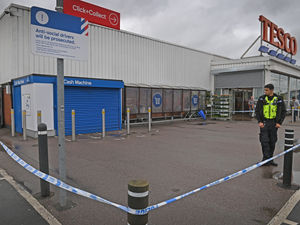 Supporting image for story: Police car 'pelted with bricks' by suspected robbers attempting to steal supermarket cash machine