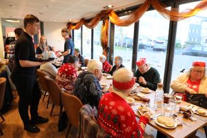 Telford College students serving a festive feast to members of the Dawley Dinner group at the college’s Orange Tree restaurant in Wellington.