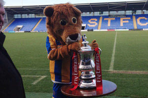 Shrewsbury Town mascot Lenny the Lion with the FA Cup
