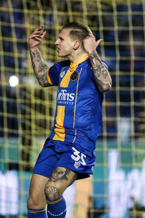 Jason Cummings of Shrewsbury Town celebrates after scoring a goal to make it 1-2 (AMA)