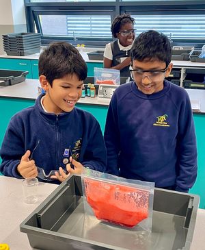 Jesse Maree and Akshaj Unmthaan from Wrekin View taking part in one of the experiments at the opening of the science centre.