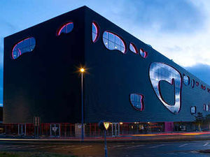 Supporting image for story: The Public's architect in attack over budget cuts