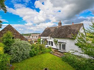 Supporting image for story: Grade II listed property up for sale complete with mysterious 12th century stone carvings