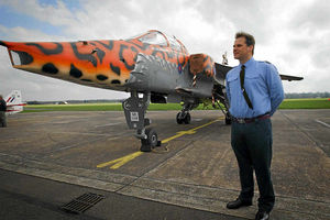 Wing Commander Paul Lilly next to the Jaguar G3 at RAF Cosford. This years air show will take place on June 8.