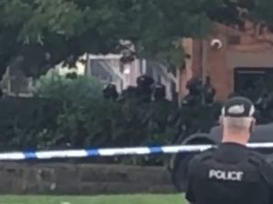 Supporting image for story: Dramatic footage shows armed police storming house to bring 24-hour siege to an end