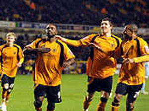 Supporting image for story: Wolves 3 Derby 0 in pictures
