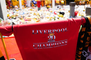 A Liverpool shirt amongst tributes at Molineux