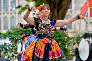 SHREW COPYRIGHT SHROPSHIRE STAR STEVE LEATH 25/07/2021..Pic in Shrewsbury Town Centre, where as part of the 'Miles of Smiles' event, there were various cultural events happening around the town. Here next to St Alkmunds Church, Silver Lotus Tribal perform from Ironbridge and surroundings..