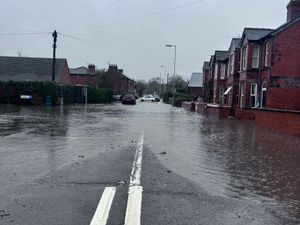 Supporting image for story: 'Stay away!' - Warning as flood water cascades into Shropshire village amid rains of Storm Bert