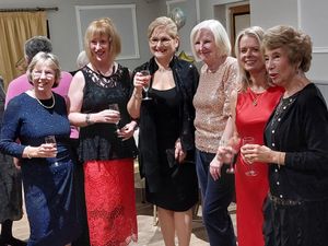 Members raise a glass to Bicton & Oxon WI!