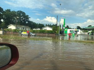 Supporting image for story: Fire crews rescue stranded cars and clear flooded properties as storms rage over Shropshire