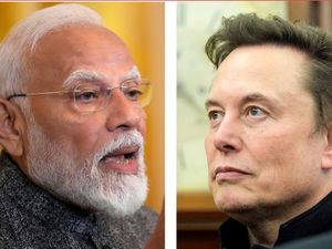 India’s Prime Minister Narendra Modi, left, and Elon Musk, right