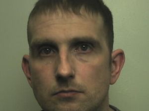 Supporting image for story: Burglar who broke into home and unwrapped Christmas presents is jailed