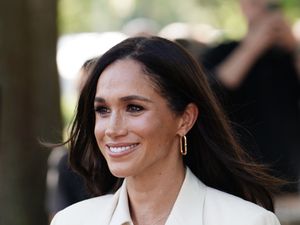 Supporting image for story: Meghan shares clip of her and Lilibet beekeeping in matching gear
