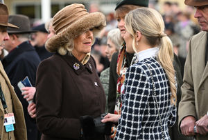 Queen Camilla greets Charlotte Giles, girlfriend of the late Michael O'Sullivan, as they attend 'Style Wednesday'. (Photo by Eddie Mulholland - WPA Pool/Getty Images)