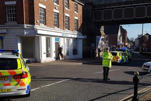 Police at the scene of the bank raid in Shifnal