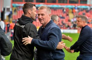 Former Walsall defender and manager Dean Smith with current boss Mat Sadler