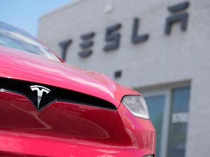 Supporting image for story: Tesla posts surprise £1.68bn third-quarter profit, up 17.3% from a year ago