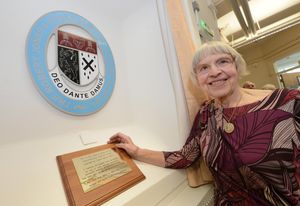 Gill Cripps pictured with the replica pin badge