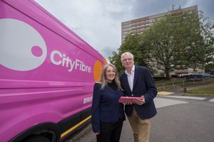 CityFibre’s Partnership Manager for Wolverhampton, Charlie Kitchin, and the City of Wolverhampton Council's Cabinet Member for Governance and Digital Councillor Jeszemma Howl in Leasowes Drive, Wolverhampton, outside Highfields Court, Pennwood Court and St Josephs Court.
