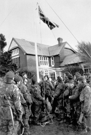 A British flag is raised in victory