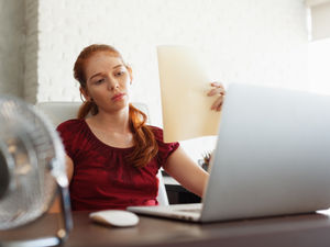 Supporting image for story: Is it too hot to work? Health and safety experts explain what the heatwave means for the workplace
