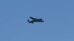 Lancaster Bomber flies near Ocker Hill in the West Midlands.