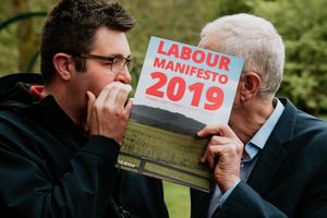 A quiet word in your ear . . . council leader Shaun Davies talking with Jeremy Corbyn 