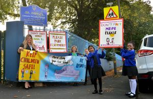 Principal Amy Pritchard and front Maria Uzzaman, Zoe Togarepi, and back: Kaya Burzawa and Daniel Michilk