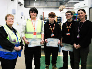 Callum Jones, Riley Tranter and Joshua Towle receive their certificates from tutor Angie Pitchford and learner manager Nikki Steadman.