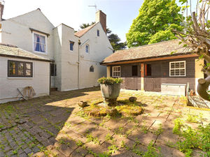 An array of outbuildings offer immense development potential subject to planning consent. Photo: Savills/Zoopla