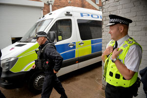 Chief Constable Craig Guildford watches his officers in action