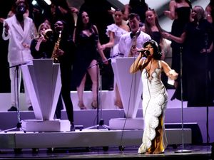 Supporting image for story: Raye makes Brit Awards history with six gongs