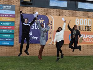 Students at Telford College celebrating their GCSE results