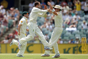 Australia's Nathan Lyon (left) celebrates after England's Ben Stokes (not pictured) was caught behind by Australia's Brad Haddin (not pictured) on 120 runs