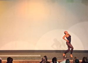Wolgarston BTEC Dance student Sienna Clayton performing her solo piece to the audience.