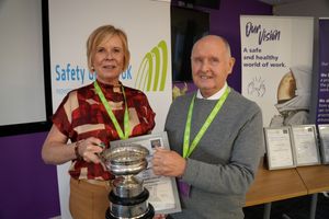 Sarah Kenny, BHSEA Secretary receiving the Albert Porter Rose Bowl from Norman Stevenson - SGUK Vice President