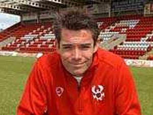 Supporting image for story: Kenna on target for Harriers