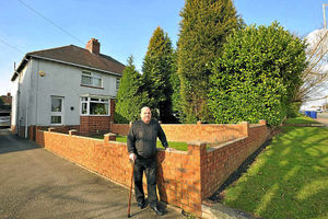 Ken Elliott who wants 25ft-tall trees cut down