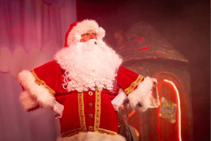 Photo Caption - Santa in the Christmas mini pantomime. 
