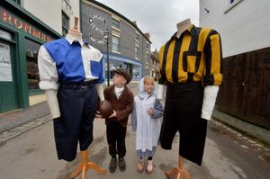 Taken in 2022, here we see replica vintage football kits for Shrewsbury Town and Wolverhampton Wanderers, as worn by Wolfie and Blue (Shrewsbury Lion). Frankie Finley (left) and Naomi Trow from Christ Church CE School Shrewsbury are wearing costumes from the time.