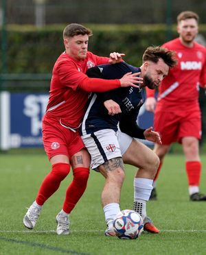 Action from Stafford Town v Stockport Georgians. Sam Lynch.