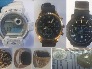 Supporting image for story: Are these yours? Stolen watches, rings and coins seized by police in Telford