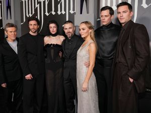 Supporting image for story: Lily-Rose Depp styles angelic glamour as Nosferatu co-stars opt for gothic looks