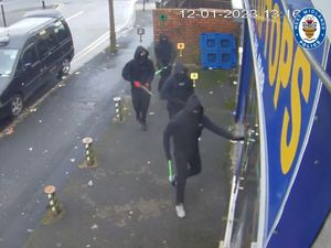 Supporting image for story: Video and photos show gang firing guns in shop attack and aftermath of axe attack on front