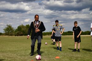 The Lord Mayor playing football with young people at Alvechurch FC