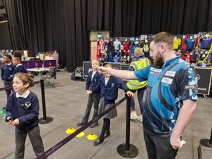 Connor also helped the children with their throws