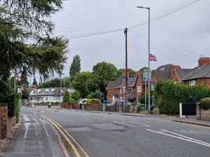 Plenty of flags have appeared on Harden Road, Leamore, where a pedestrian crossing had also been painted